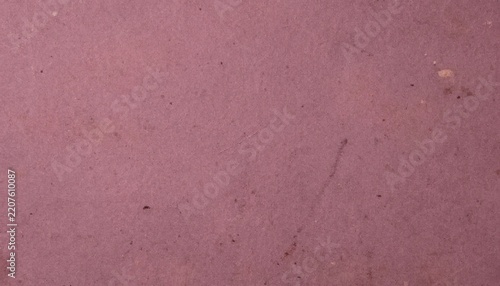 Dusty mauve paper texture with scattered speckles, fine scratches and faded stains, creating a soft vintage surface for backgrounds, stationery, posters and creative design.