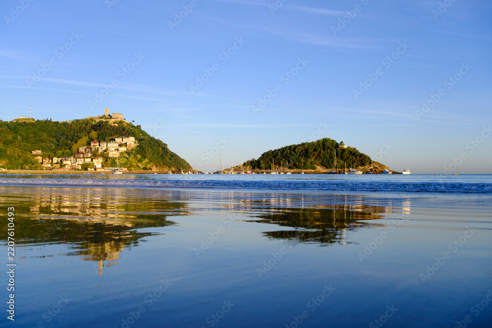 Fototapeta premium Sunrise over La Concha Bay in Donostia-San Sebastian, Basque Country, Spain