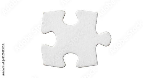 Fotografie Single white blank puzzle piece with a textured surface is isolated on a clean w