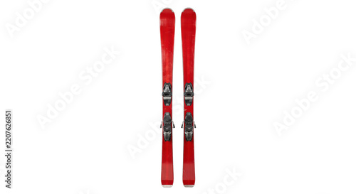 Pair of vibrant red alpine skis with bindings, showing some wear and tear, isolated on a clean white background