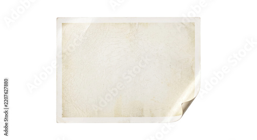 Old blank rectangular photo paper with curled corner and cracked texture isolated on a white background