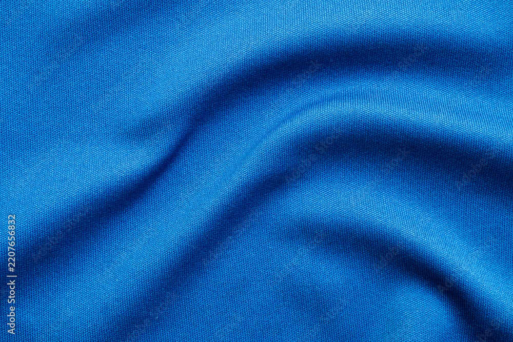 Fototapeta premium Blue sports clothing fabric football shirt jersey texture close up