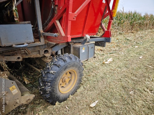 Agricultural Corn Harvesting Machine Working in a Cornfield