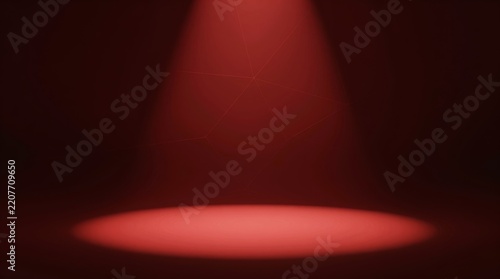 Red spotlight illuminates a dark stage. Faint dust particles drift in the air