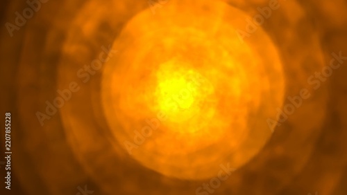 Intense orange glow pulses from central core. Radiant energy swirls outward in concentric rings
