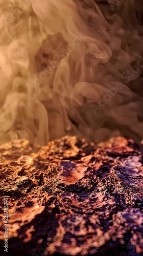 Abstract Cinematic Background With Flowing Smoke and Rough Rocky Terrain in Warm Lighting