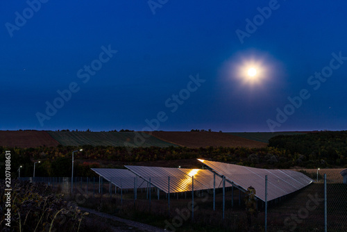 A large solar panel in a field
