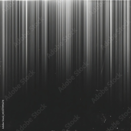 Abstract monochrome light rays pattern with vertical silver streaks for digital backdrop.