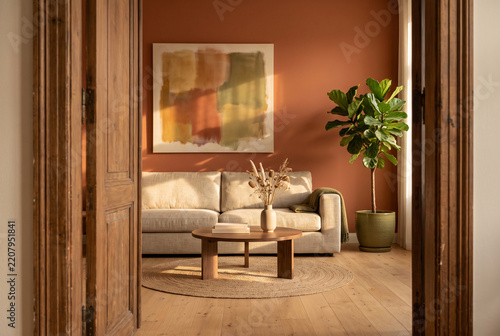 Livingroom interior with sofa plant and warm wall art