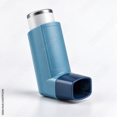 Medical blue asthma inhaler for respiratory relief isolated on a neutral white studio background