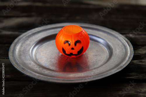 Halloween pumpkin lantern on a plate