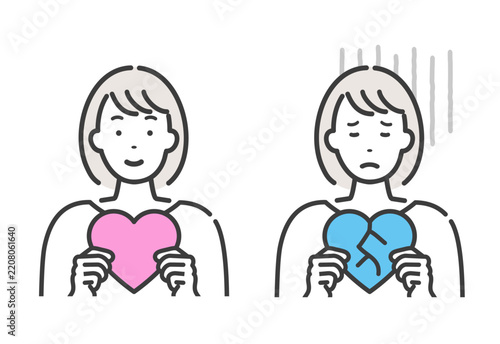 ハートを手に持つ若い女性　愛と失恋