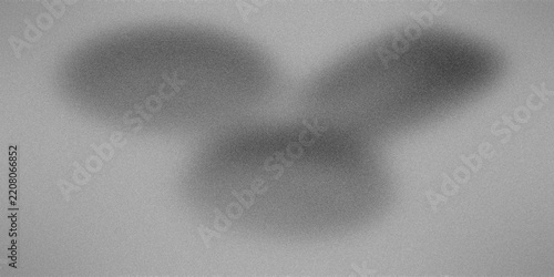 Abstract abstract gray forms in soft blurred shape on textured background
