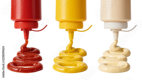 Fotografie Red ketchup yellow mustard and beige mayonnaise bottles dispensing sauces, isola