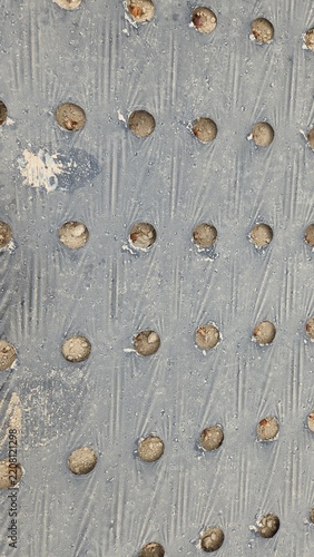 agricultural mulching film with pre-cut holes, soil, mulching film with evenly spaced holes, view of soil visible through the holes, texture, background, simple, wallpaper