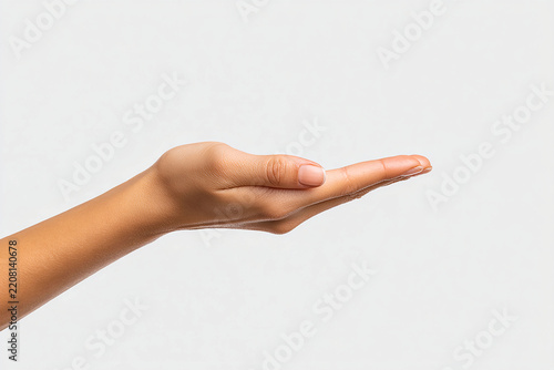 Close-up of an outstretched hand on a white background palm up with space for product presentation