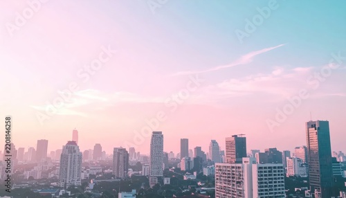 Panoramic Cityscape at Sunrise with Pastel Hues.