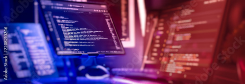 Naklejka Professional Coding Environment with Source Code, Software Engineering Monitors and Futuristic Developer Workstation