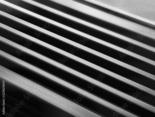 Black and white diagonal abstract metal stripes