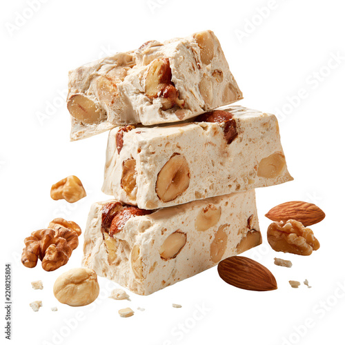 Nougat confections with almonds and hazelnuts on a white background