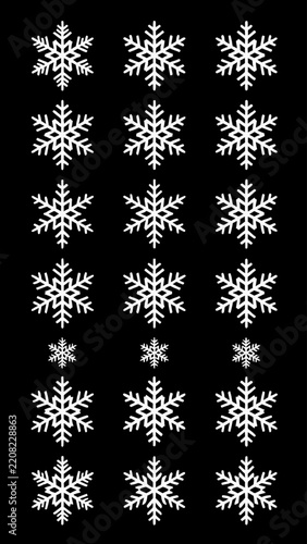Snowflake pattern background with white festive holiday symbols on a dark surface
