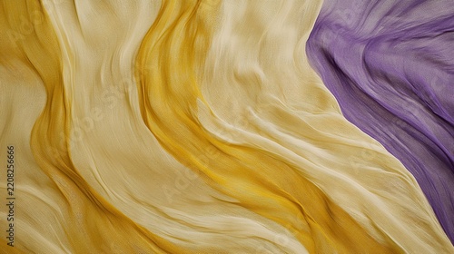 Close-up of flowing golden yellow and purple satin fabric with wave-like folds and silky texture