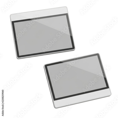 Two white tablet devices with blank screens on black background