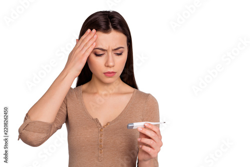 Portrait of disappointed lady youth touch hand forehead check temperature she her cant believe sad upset dressed modern clothing isolated grey background