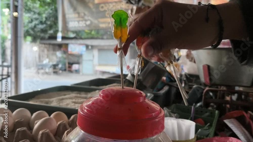 Colorful Lollipop Display in a Traditional Market