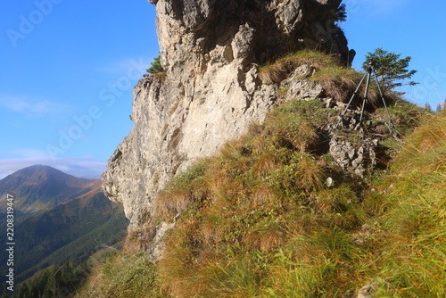 Aerial view of Mnichy Chochołowskie rock towers and Skorusi Źleb gully on a sunny summer day, Tatra Mountains