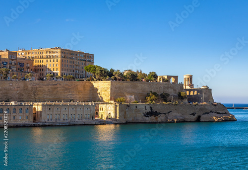 Exposure done by the sea shore in Valletta, showing the beautiful sea color and the typical construction, Malta