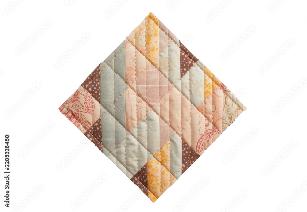 Obraz premium Handmade quilted patchwork with various fabric patterns in a diamond shape