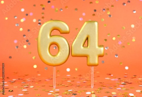 Golden Number Sixty Four Cake Topper With Confetti Background