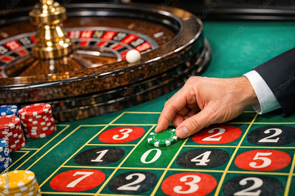 Obraz premium A roulette game setup with chips on the table, ready for play