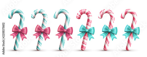 Set glossy candy canes with ribbon bows in teal and pink on a white background. Festive set for gift wrapping, cards and holiday design. Vector EPS 10.