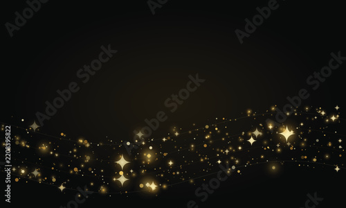 Wavy line of golden light particles and stars on dark background, festive decoration