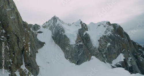 Aerial view of the rugged snow-capped peaks and glaciers of Mount McKinley in Denali Borough, Alaska, United States.