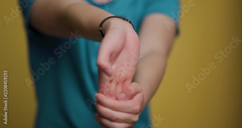 Man performs wrist stretching exercises for improved flexibility and health benefits