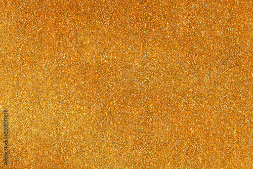 Golden glitter texture background for luxury branding projects and festive web design presentation