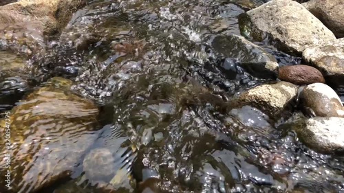 water flowing into the river