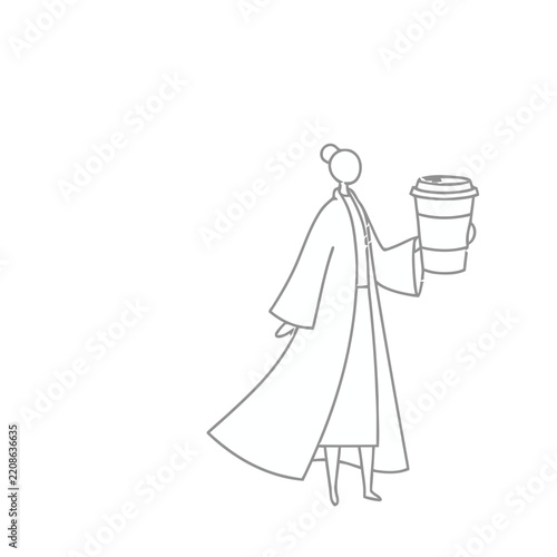 Woman holding a coffee cup