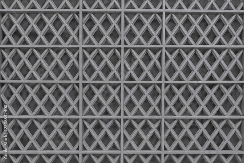 Obraz na plátně Grey plastic cart texture featuring a dense repeating lattice pattern with raised intersecting strips and a neutral industrial surface