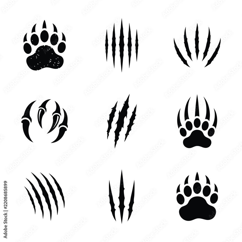 Fototapeta premium Black animal paw print and claw mark icons set isolated on white background design element