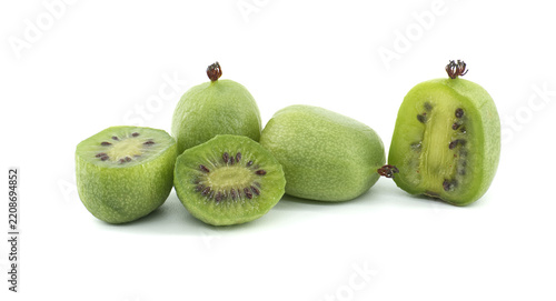Fresh Hardy Kiwi Berries Halved and Whole Displayed Together Isolated on Clean White Background