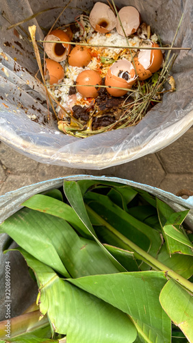 Compost kitchen waste recycling in a home kitchen with a variety of organic materials ready for composting