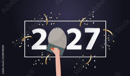  happy new year 2027 2027 with hand holding a trowel plastering
