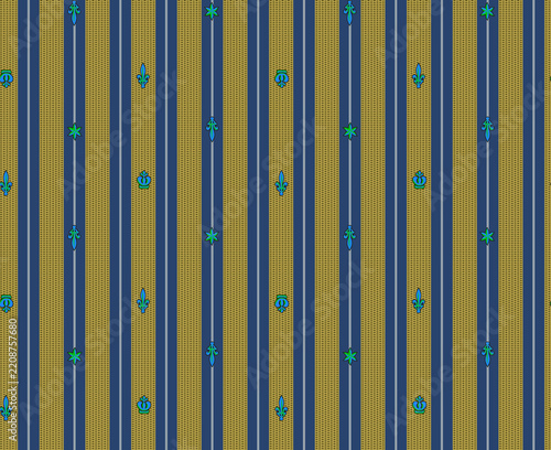 Close up of vibrant yellow fabric with blue and green floral embroidery pattern texture