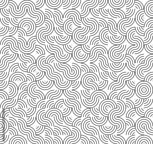 Abstract seamless pattern of interlocking black circular as isolated element