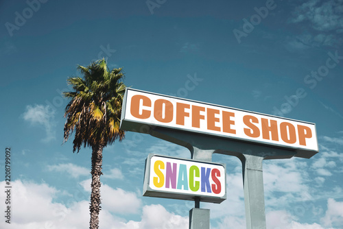 Aged retro coffee shop and snack sign with palm tree