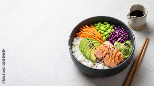 Grilled Salmon Poke Bowl with Avocado and Edamame Served in Black Bowl with Copy Space